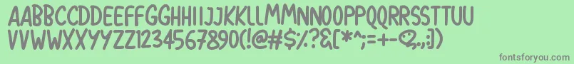 フォントBalloon Pops – 緑の背景に灰色の文字