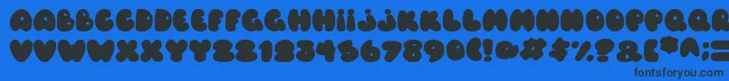 Fonte Balloons Italic – fontes pretas em um fundo azul