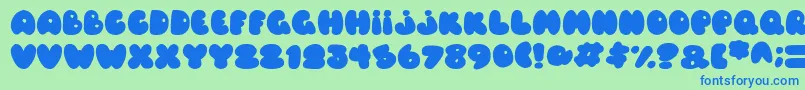 Fonte Balloons Italic – fontes azuis em um fundo verde