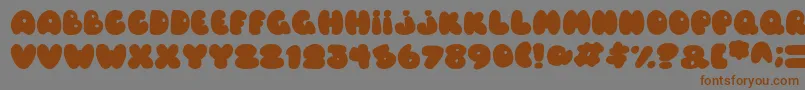 Шрифт Balloons Italic – коричневые шрифты на сером фоне