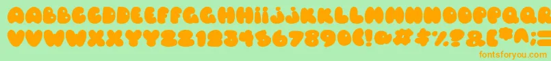 Czcionka Balloons Italic – pomarańczowe czcionki na zielonym tle