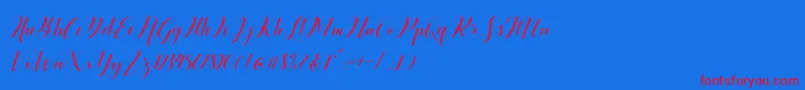 Ballqis Script Font – Red Fonts on Blue Background