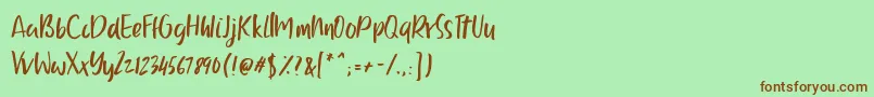 フォントBallystic – 緑の背景に茶色のフォント