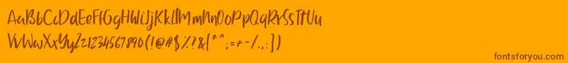 Czcionka Ballystic – brązowe czcionki na pomarańczowym tle
