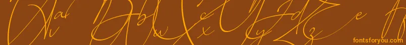 Baltimore Regular   Italic Font – Orange Fonts on Brown Background