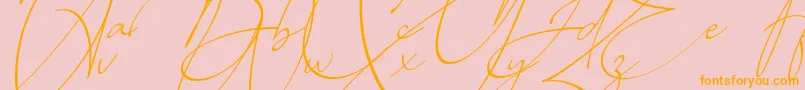 フォントBaltimore Regular   Italic – オレンジの文字がピンクの背景にあります。