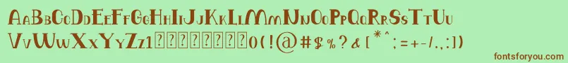 Balutteli Serif-fontti – ruskeat fontit vihreällä taustalla