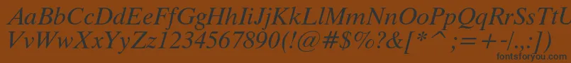 ThamescItalic-Schriftart – Schwarze Schriften auf braunem Hintergrund