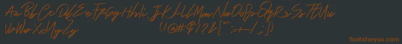 Bambang-Schriftart – Braune Schriften auf schwarzem Hintergrund