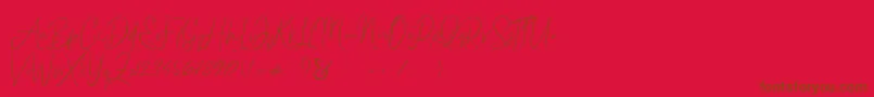 Bammantoe Font – Brown Fonts on Red Background
