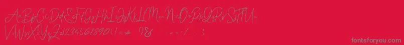 Bammantoe-Schriftart – Graue Schriften auf rotem Hintergrund