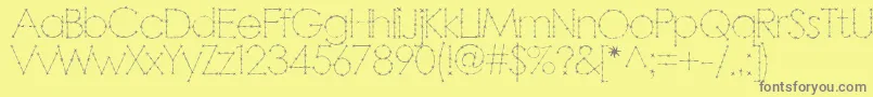Czcionka BARBAR   – szare czcionki na żółtym tle