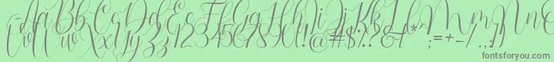 Barbara Blast Demo-Schriftart – Graue Schriften auf grünem Hintergrund