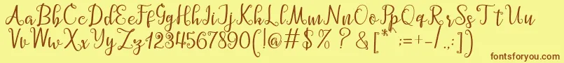 Fonte Barbara Script – fontes marrons em um fundo amarelo