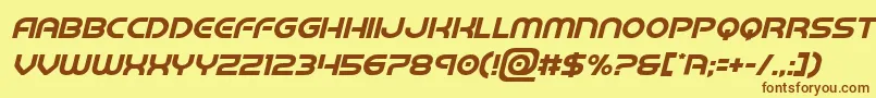 フォントbarcadenobarital – 茶色の文字が黄色の背景にあります。