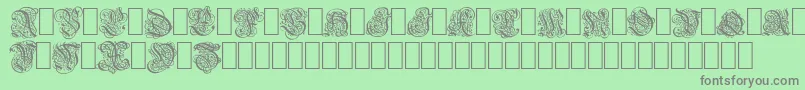 barock1-Schriftart – Graue Schriften auf grünem Hintergrund