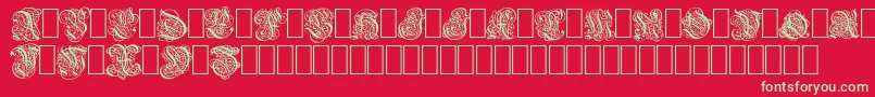 barock1-Schriftart – Grüne Schriften auf rotem Hintergrund