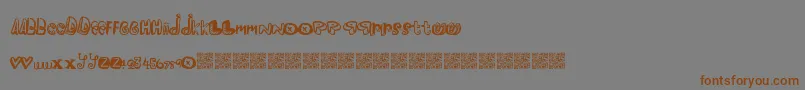 Шрифт Pleasureriot – коричневые шрифты на сером фоне