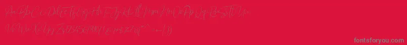 Barosaki Script-Schriftart – Graue Schriften auf rotem Hintergrund