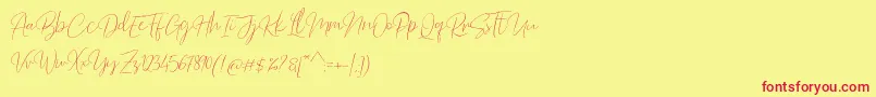 Fonte Barosaki Script – fontes vermelhas em um fundo amarelo