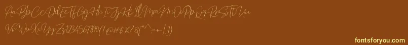 Barosaki Script Font – Yellow Fonts on Brown Background