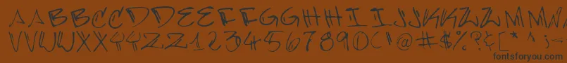 BARRA-Schriftart – Schwarze Schriften auf braunem Hintergrund