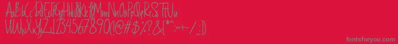 フォントBasfar – 赤い背景に灰色の文字
