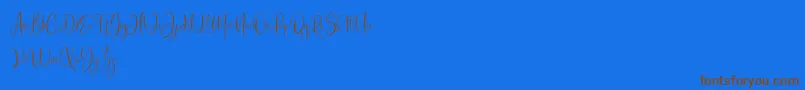 Bashira Free-Schriftart – Braune Schriften auf blauem Hintergrund