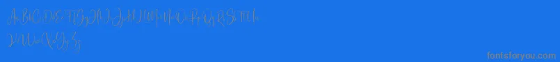 Bashira Free-Schriftart – Graue Schriften auf blauem Hintergrund