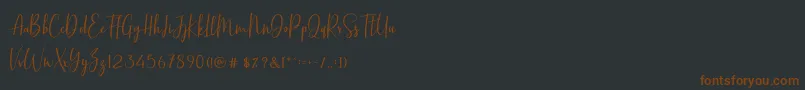 BasstonScript-fontti – ruskeat fontit mustalla taustalla
