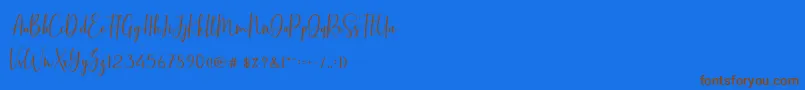 BasstonScript Font – Brown Fonts on Blue Background