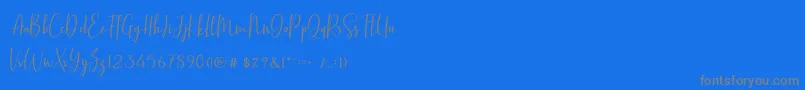 BasstonScript-Schriftart – Graue Schriften auf blauem Hintergrund