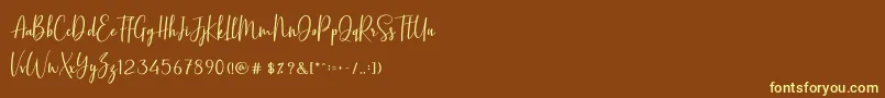 BasstonScript Font – Yellow Fonts on Brown Background