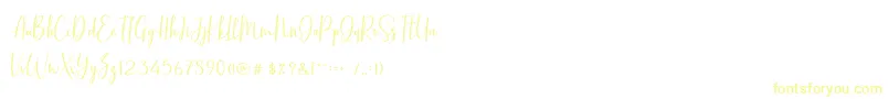 フォントBasstonScript – 白い背景に黄色の文字