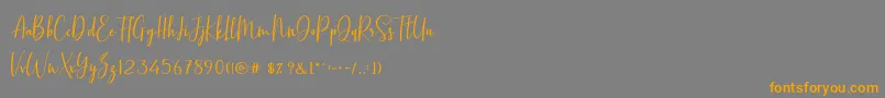 BasstonScript Font – Orange Fonts on Gray Background