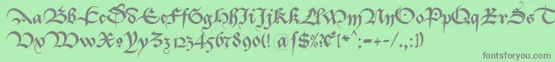 Bastarda K-Schriftart – Graue Schriften auf grünem Hintergrund