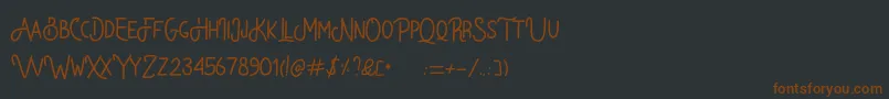 Bataler Font – Brown Fonts on Black Background