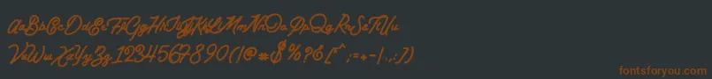 BataviaScriptClean Font – Brown Fonts on Black Background