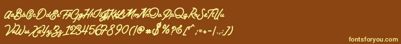 BataviaScriptClean-fontti – keltaiset fontit ruskealla taustalla