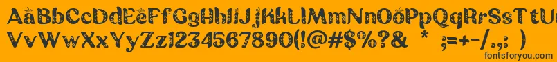 Batik Ganasan Font – Black Fonts on Orange Background