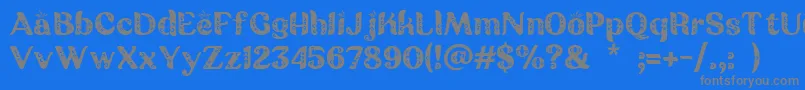 Czcionka Batik Ganasan – szare czcionki na niebieskim tle
