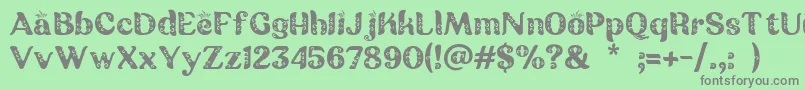 Batik Ganasan Font – Gray Fonts on Green Background