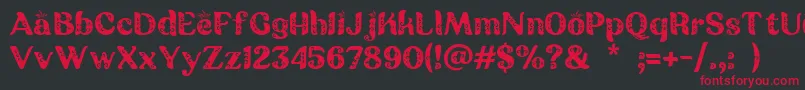 Шрифт Batik Ganasan – красные шрифты на чёрном фоне