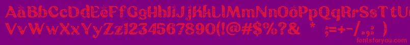 Batik Ganasan-Schriftart – Rote Schriften auf violettem Hintergrund