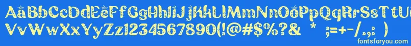 Batik Ganasan Font – Yellow Fonts on Blue Background