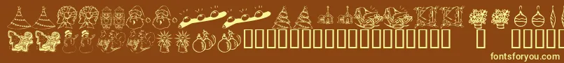 KrChristmasDings2004Two Font – Yellow Fonts on Brown Background