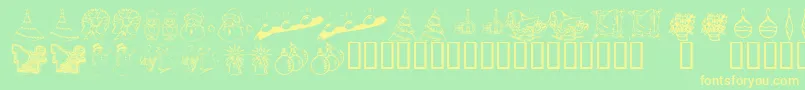 KrChristmasDings2004Two Font – Yellow Fonts on Green Background