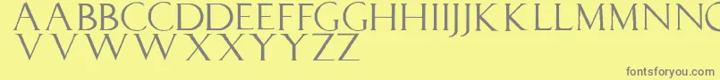 フォントLucapaciolirough – 黄色の背景に灰色の文字