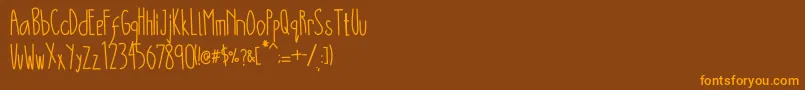Battani Font – Orange Fonts on Brown Background