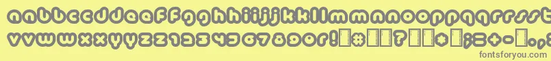 フォントBaubau – 黄色の背景に灰色の文字